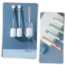 Escova e esponja de limpeza doméstica Aomeily com design de furo suspenso para facilitar armazenamento.