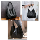 Sac à main oversized clássico da Udiyo, com design amplo e elegante, feito de material resistente em tom neutro.