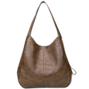 Sac à main oversize Udiyo, saco grande clássico em material resistente, com alças largas e design elegante.