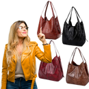 Sac à main oversize Udiyo em várias cores, com alça longa e design clássico, feito de material resistente e elegante.