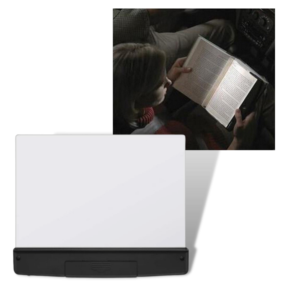 Lâmpada de leitura LED portátil Yks com luz suave, ideal para leitura noturna, mostrada conectada a um livro aberto.
