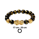 Pulseira de obsidiana preta com detalhes dourados da marca I-Mart, feita de pedras lisas e elegantes para estilo e proteção