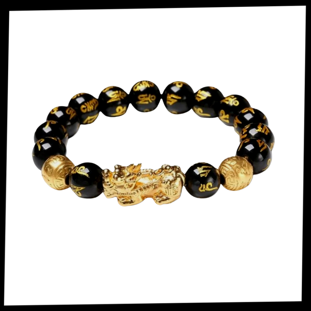 Pulseira de obsidiana preta e detalhes dourados da I-Mart, acessório de estilo com acabamento refinado e design elegante.