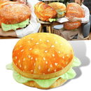Almofada em forma de hambúrguer para sofá ou cadeira, da marca Genuiskids, com detalhes coloridos de queijo, alface e carne.