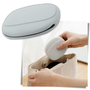 Estojo de silicone Dido para acessórios eletrônicos e de áudio pequenos, com fecho e acabamento resistente.