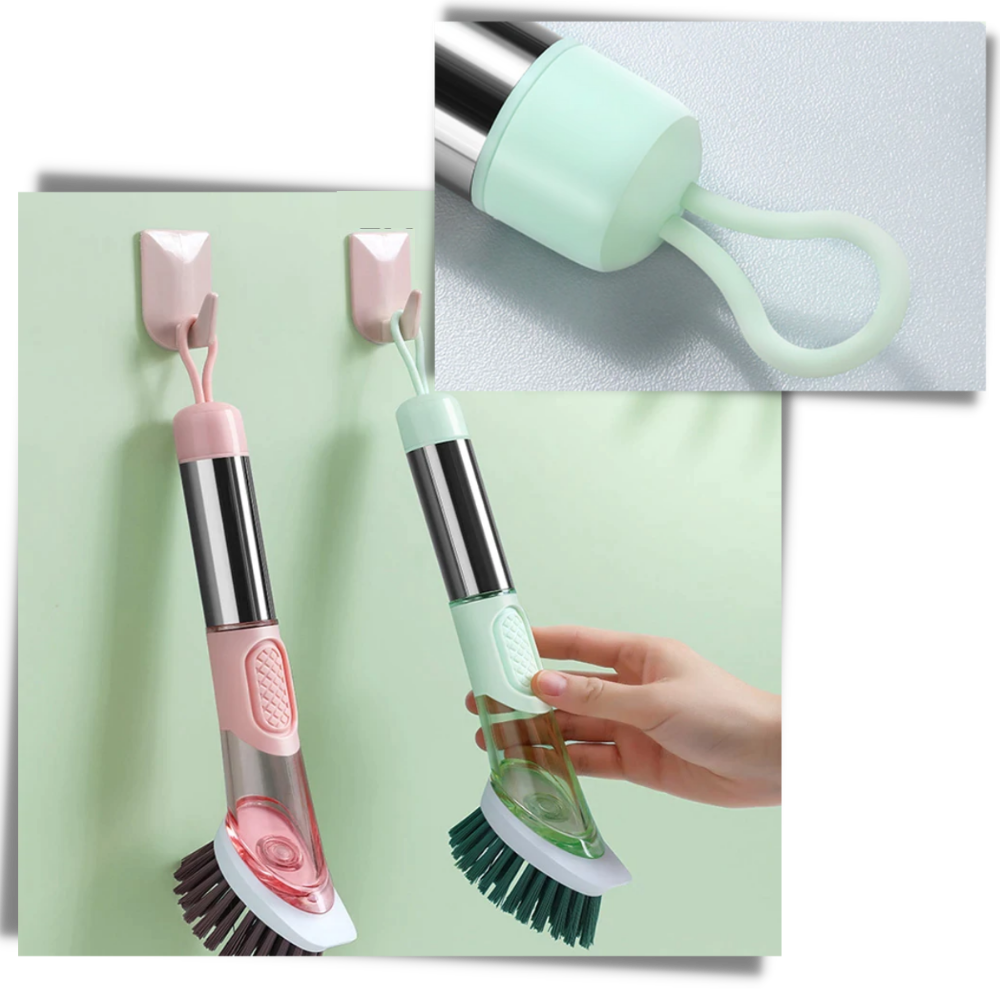 Escova de louça Tina&Tony com dispenser de sabão, prática para limpeza doméstica, com cabo e corpo de plástico branco.