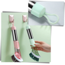 Escova de louça Tina&Tony com dispenser de sabão, prática para limpeza doméstica, com cabo e corpo de plástico branco.