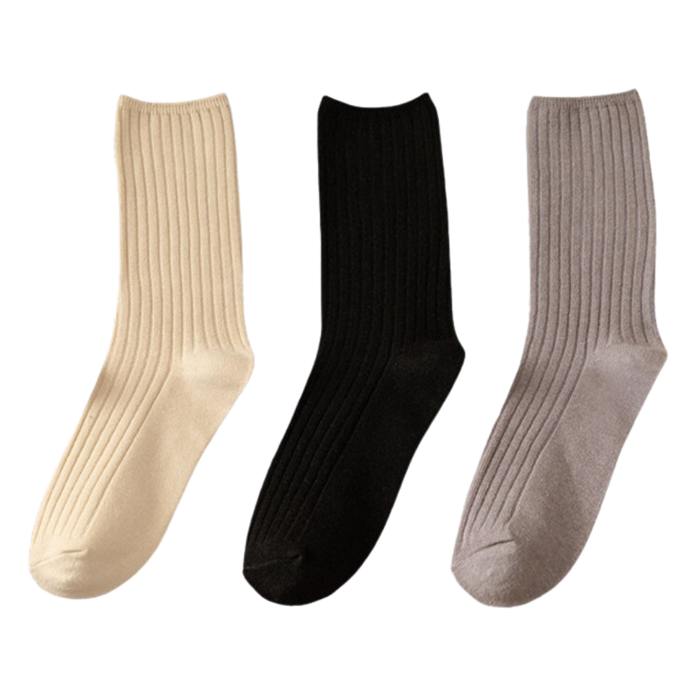 Três pares de meias de algodão com textura canelada para mulheres, da marca Sierra Socks, visualizadas dobradas e empilhadas.