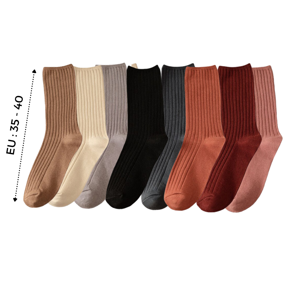 Três pares de meias de algodão com acabamento listrado para mulheres, da marca Sierra Socks, em tons neutros.