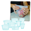 Conjunto de 8 sacos reutilizáveis de silicone para armazenamento de alimentos, com fechamento zip e vedação à prova de vazamentos.