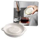 Râpe de cozinha em cerâmica Tawohi com design ergonômico, ideal para ralar alho e outros ingredientes.