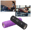 Rolo de espuma Black para exercícios de massagem, ideal para Pilates e yoga, com superfície texturizada para relaxamento muscular.