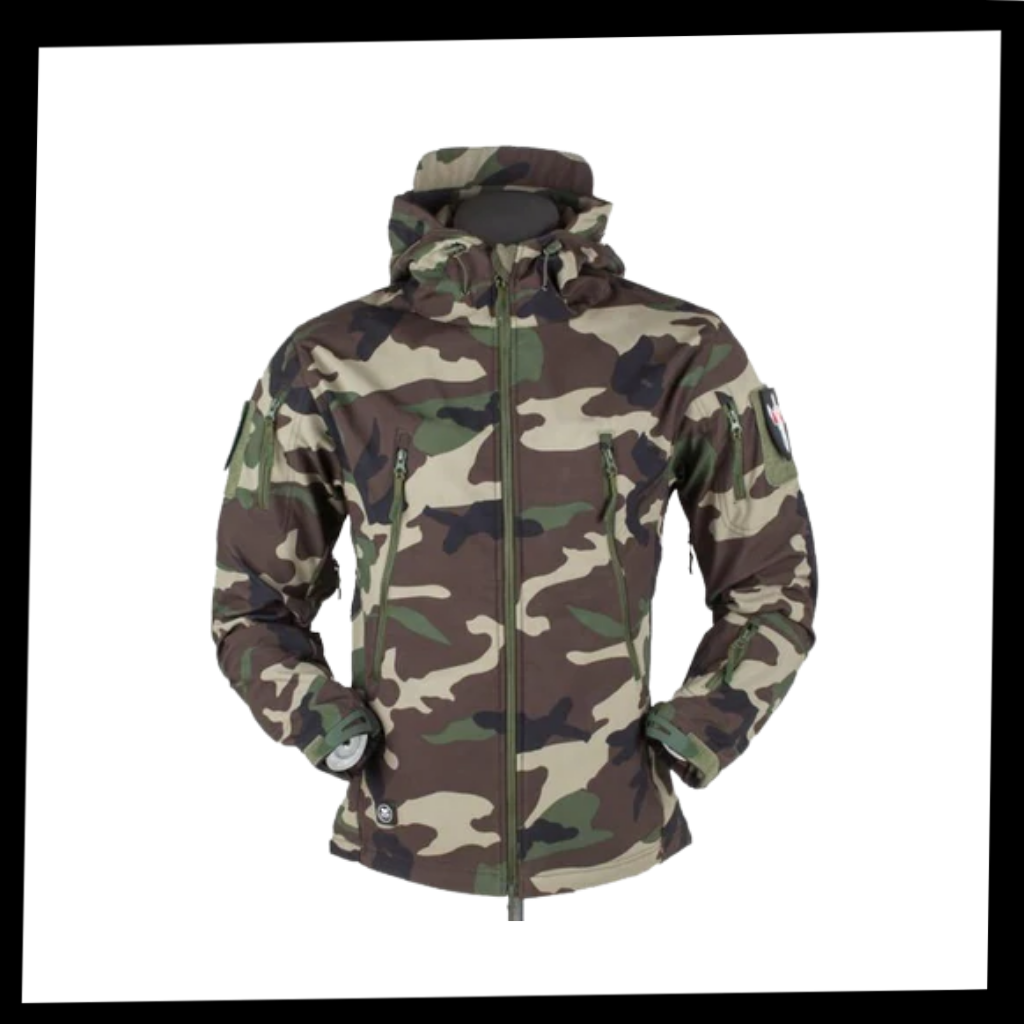 Jaqueta militar Tacvasen de roupas de exterior, com detalhes em tecido resistente e design tático para atividades ao ar livre.