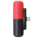 Carregador portátil em forma de cápsula vermelha Hesxuno, compacto e portátil, ideal para recarregar dispositivos em movimento.