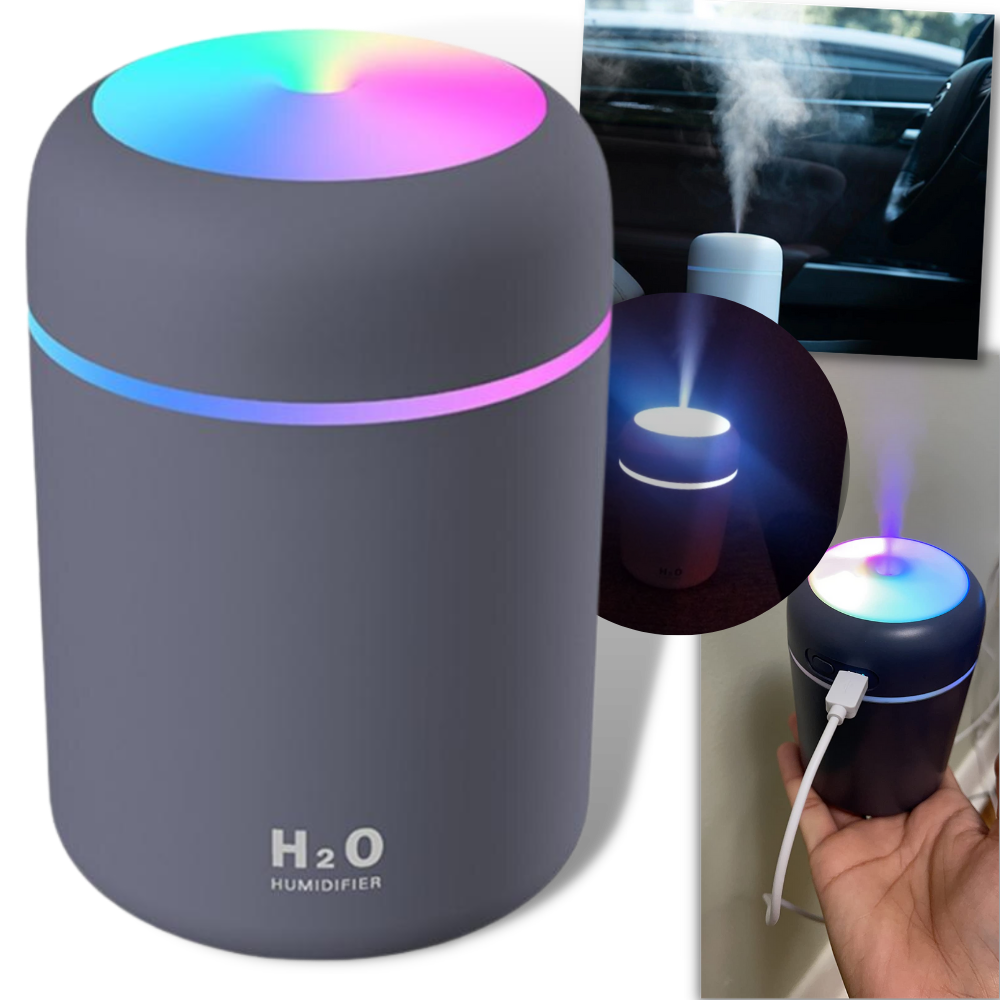 Mini umidificador de ar e difusor de óleos essenciais Hqzy, compacto, ideal para um ambiente mais confortável e aromático.