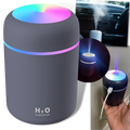 Mini umidificador de ar e difusor de óleos essenciais Hqzy, compacto, ideal para um ambiente mais confortável e aromático.