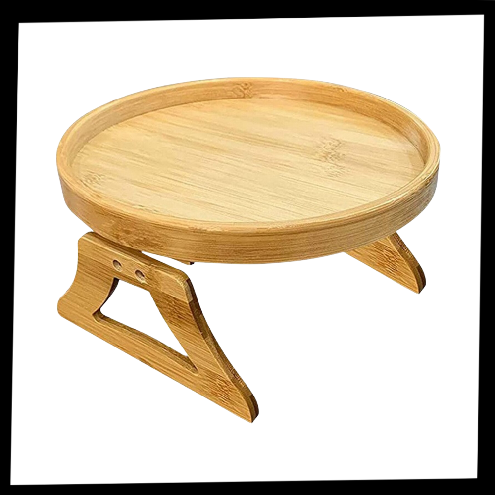 Consola de mesa dobrável com apoio de braço em madeira da marca Susenc, mostrada na embalagem do produto.