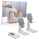 Suporte universal para telefone Yszodd, dobrável e portátil, apoiando smartphone em superfície plana.