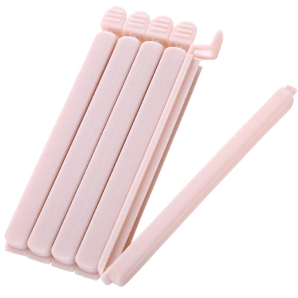 Conjunto de 15 clips de vedação rosa para sacos de alimentos, ideal para armazenamento seguro e organizado.
