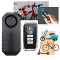 Alarme elétrica para bicicleta Fosmon, sistema de segurança para ciclismo, com sensor e controle remoto visível na imagem.