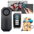 Alarme elétrica para bicicleta Fosmon, sistema de segurança para ciclismo, com sensor e controle remoto visível na imagem.