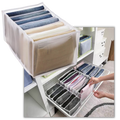 Organizador de roupas em malha da Pakewalm, ideal para arrumar e guardar roupas de forma prática e organizada.