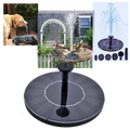 Fonte flutuante a energia solar da Ankway em um lago, com jatos de água e painel solar, ideal para jardins e piscinas.