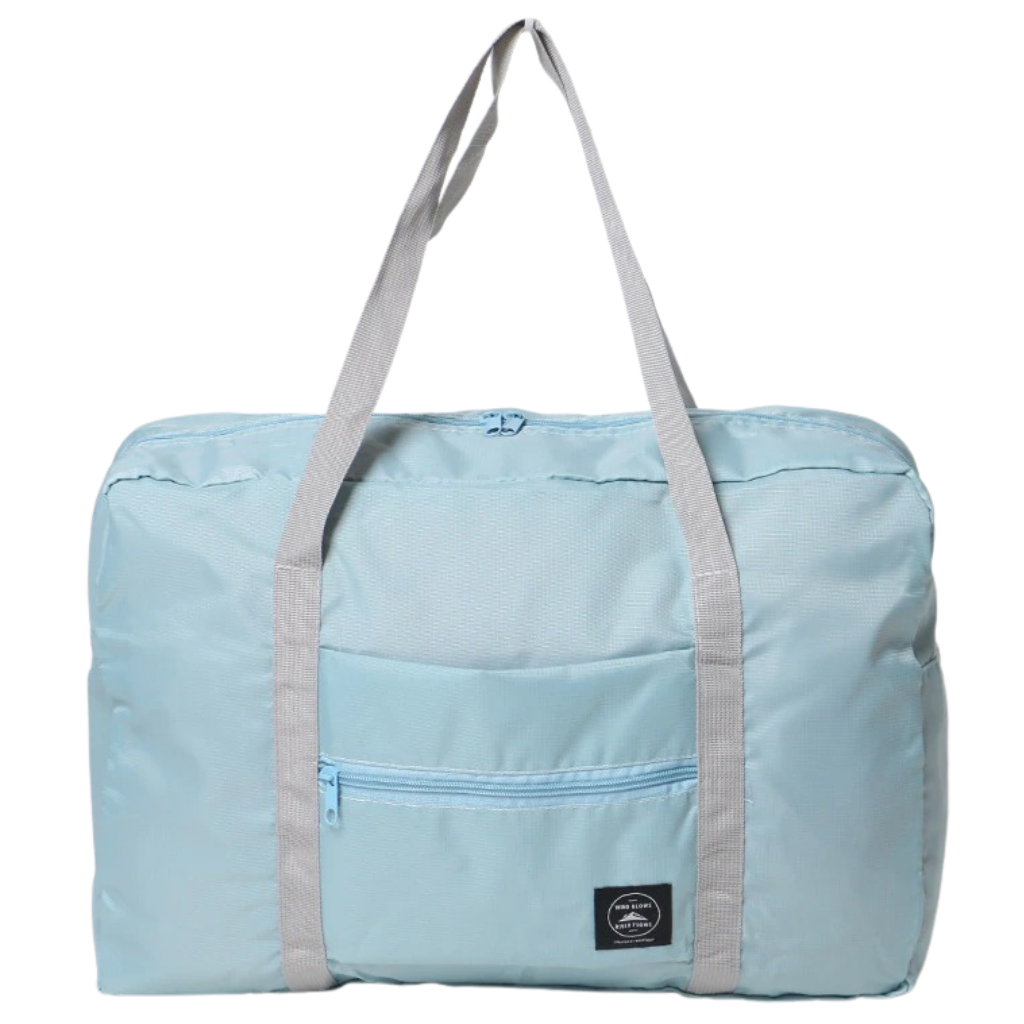Saco de viagem polochon dobrável azul claro da marca Dupashio, com alças e espaço para roupas e objetos pessoais.