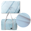 Sac de viagem pliable Dupashio, saco polochon resistente, mostrando o design dobrável e material durável.