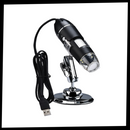 Microscópio digital USB com LED da Joyan, equipamento de laboratório para observação de amostras e detalhes microscópicos.
