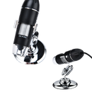 Microscópio digital USB com LED da Joyan para laboratório, mostrando lente, corpo compacto e iluminação LED ajustável.