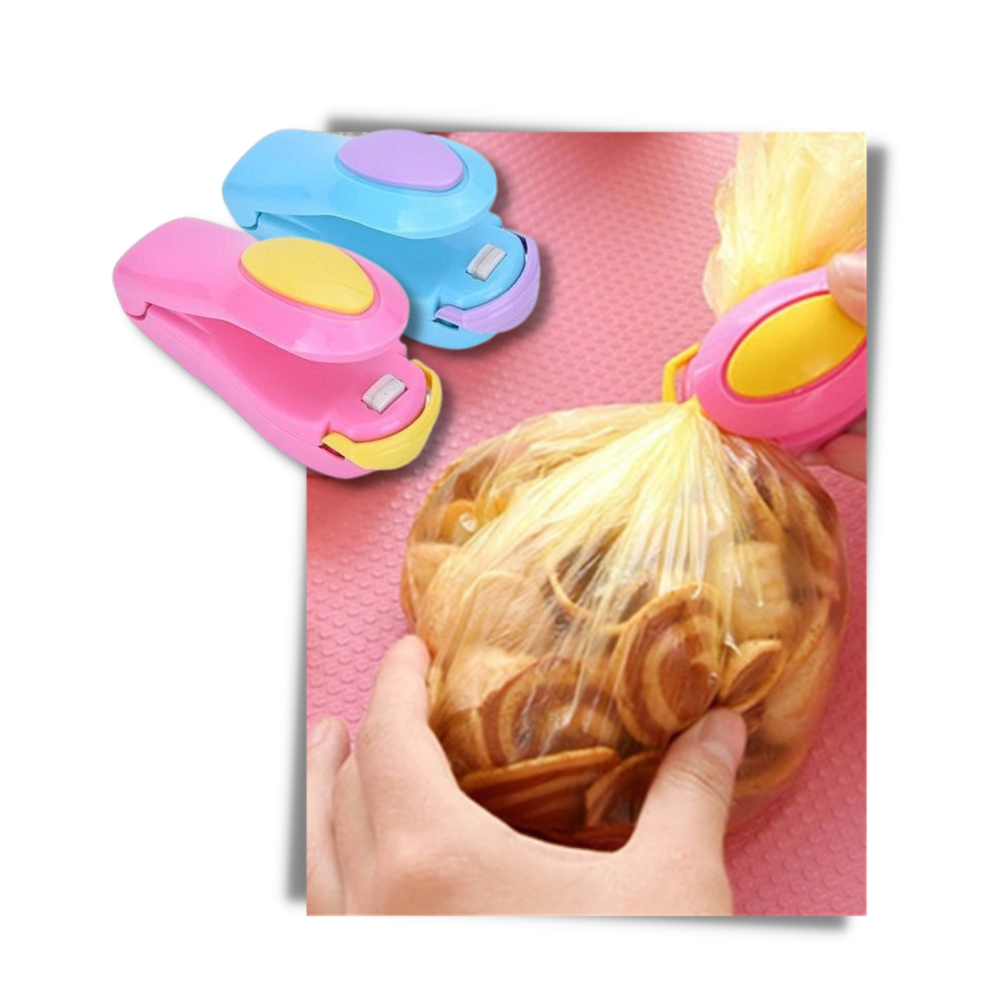 Máquina de vedação portátil Ozerty France para alimentos, ideal para selar pão fresco e manter a frescura em pequenos eletrodomésticos.