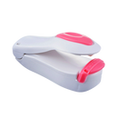 Máquina de vedação portátil da Ozerty França, pequena e branca, ideal para selar alimentos na cozinha.
