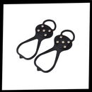 Espigões antideslizantes da Flyingtoy para atividades de inverno, com pontas de tração para segurança em superfícies escorregadias.