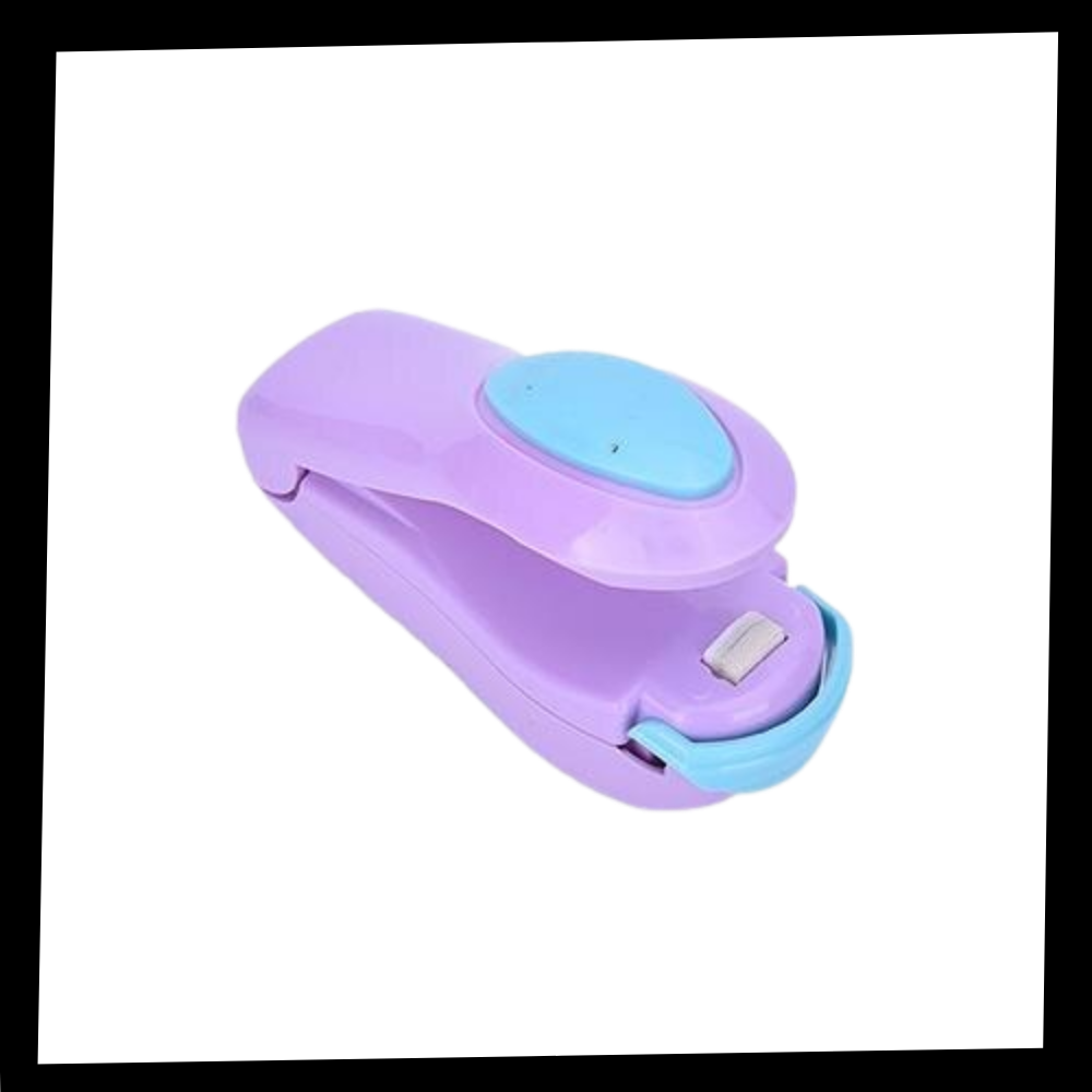 Máquina de vedação portátil Ozerty France, acessório de pequeno eletrodoméstico para selar alimentos com eficiência.