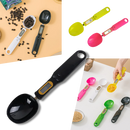 Culinary spoon with digital LCD scale for precise measurements, in a modern kitchen setting.