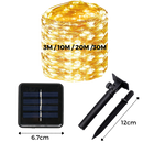 Luminária solar com fios de LED da Pure Garden, decorativa e iluminada para ambientes externos, mostrada na imagem.
