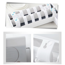 Suporte de parede 4-em-1 para filme plástico, papel toalha e utensílios de cozinha Xiaoluokaixin, instalado na cozinha.