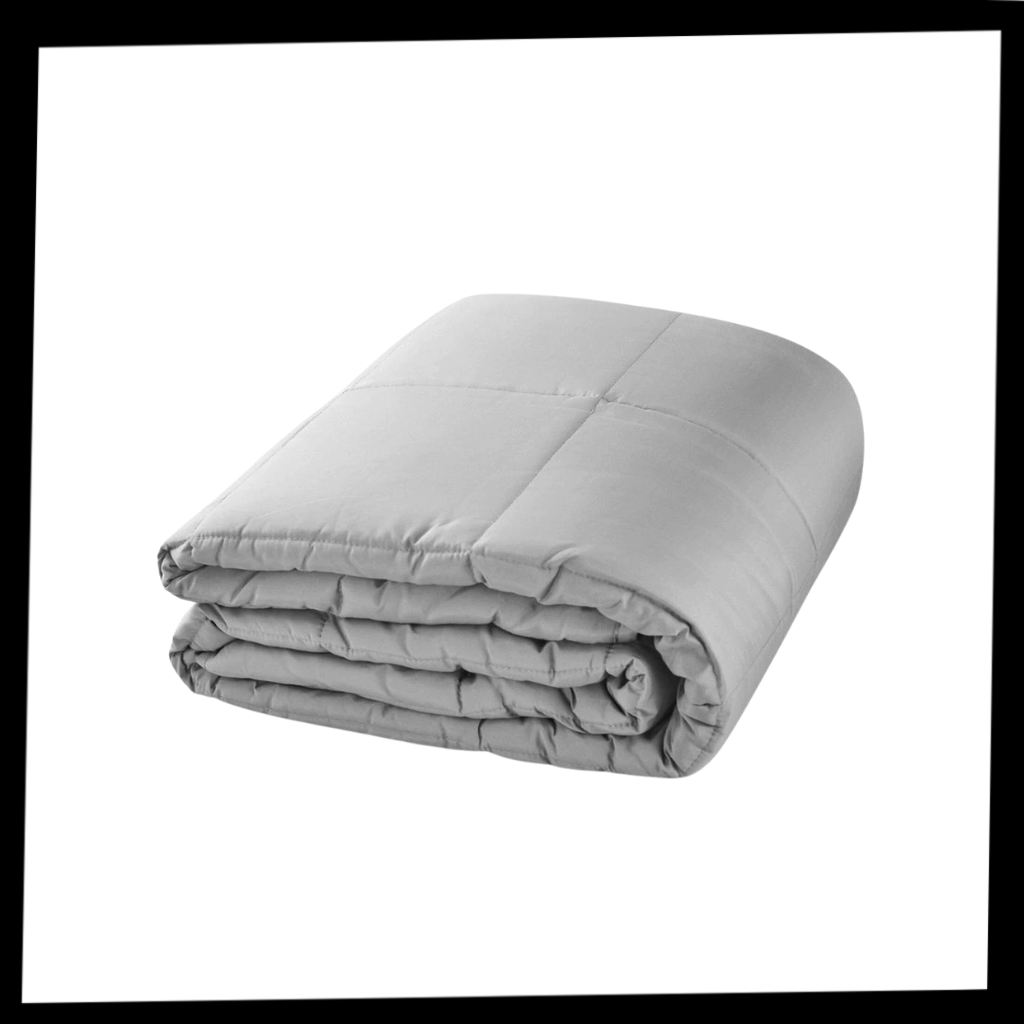 Manta pesada Nex para terapia por pressão profunda, acolchoada e confortável, ideal para relaxamento e alívio do estresse.