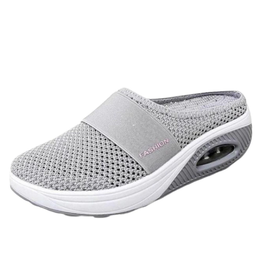 Sapatos slip-on cinza da Ozerty France com almofada de ar para diabéticos, promovendo conforto e cuidado para o tratamento do pé.