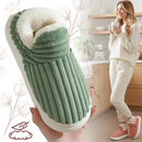 Pantuflas internas Audeban em pelúcia macia rosa, conforto e aconchego para pés quentinhos em casa.