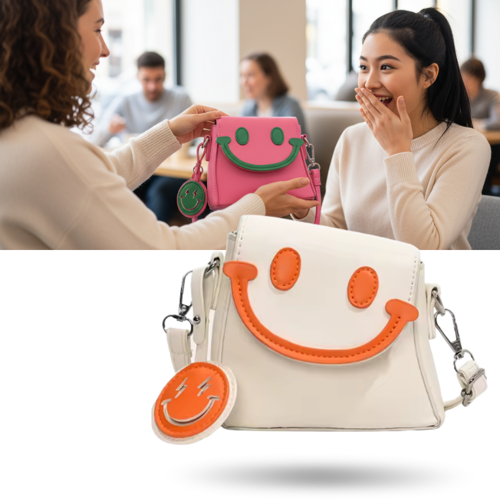 Bolsa feminina pequena Carolilly com alça de ombro, design sorridente e alegre, ideal para ocasiões casuais.