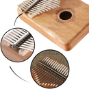 Kalimba Dido de 17 teclas, instrumento de música de dedo, na cor azul, com teclas de madeira e design compacto.