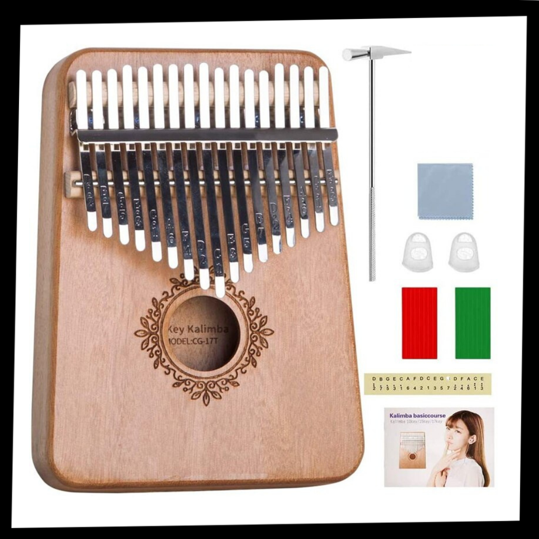 Kalimba de 17 touches da Dido, instrumento de música com corpo azul e teclas de metal, tocando na mão.