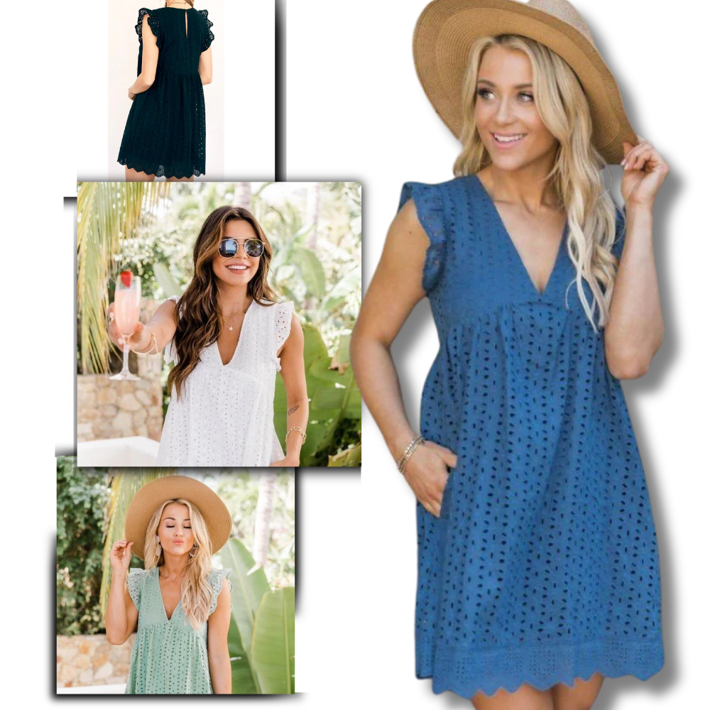 Robe elegante Hirigin em broderie anglaise com detalhes delicados e tecido leve, ideal para ocasiões especiais.