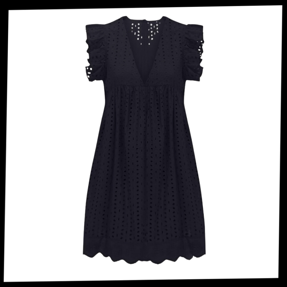 Robe elegante Hirigin em broderie anglaise com detalhes delicados, vista frontal de vestido sofisticado em tecido leve.