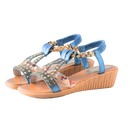 Sandálias ortopédicas elegantes boho da Gnobogi, com design confortável e estilo sofisticado em tom azul.