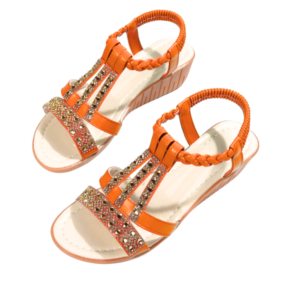 Sandálias ortopédicas elegantes e boho da Gnobogi em tom laranja, com design confortável e estilo moderno.