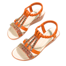 Sandálias ortopédicas elegantes e boho da Gnobogi em tom laranja, com design confortável e estilo moderno.