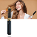 Escova secadora multifuncional Faslmh para cuidados capilares, em cor cinza, com design prático e tecnologia avançada.